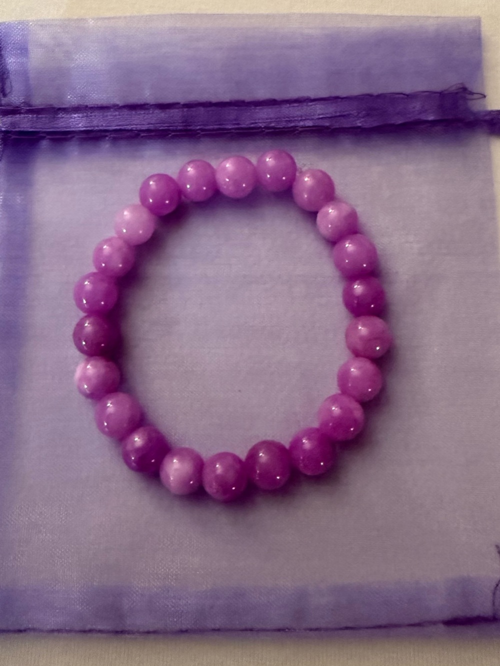 NWOT (Never Worn) Flexible Lightweight Purple Beaded Women’s Stretch Bracelet